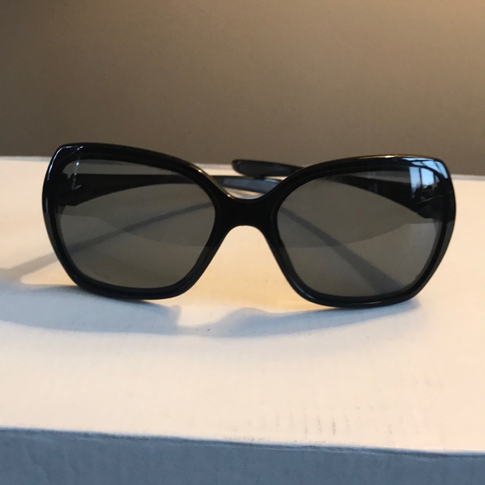 Oversized black Oakley glasses with plastic frame